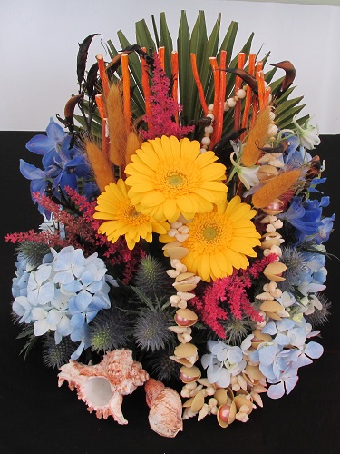 An arrangement of flowers and shells