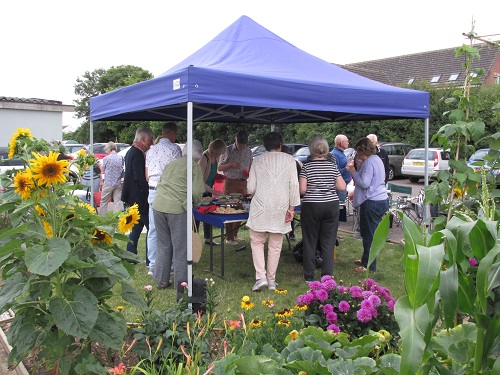 Garden party - members gathered under the gazebo