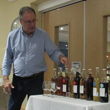 Kevin Martin - wine judge - pointing out the wines he has brought for tasting