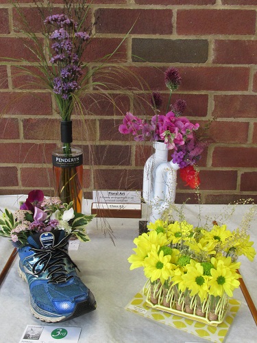 Flower arrangements in unusual containers